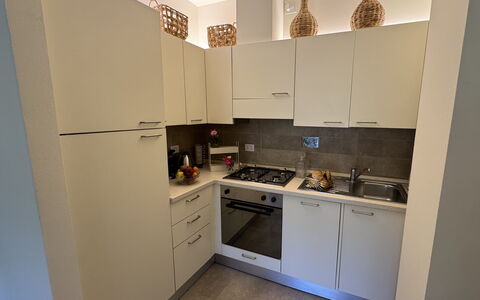 Ai Cantici: Kitchen, Kitchen Appliance, Major Appliance, Countertop, Flooring, Interior Design, Cabinetry, Floor, Stove, Kitchen Stove