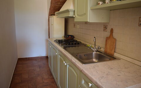 Oasi Della Pergola: Kitchen, Countertop, Flooring, Wood, Interior Design, Kitchen Appliance, Major Appliance, Kitchen Sink, Cabinetry, Floor