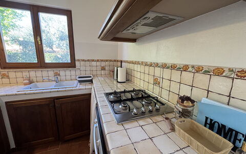 Dependance Egle: Kitchen, Wood, Flooring, Countertop, Interior Design, Floor, Kitchen Appliance, Kitchen Stove, Gas Stove, Room