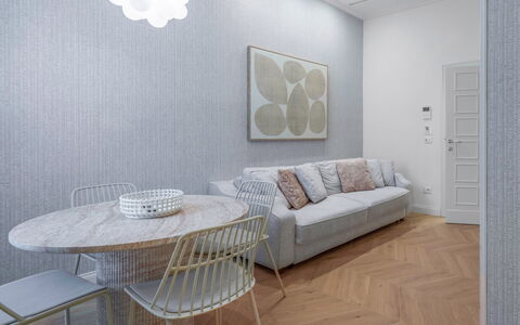 Elegant Apartments Near the Duomo: Furniture, Interior Design, Flooring, Floor, Wood, Ceiling, Home, Living Room, Room, Wood Flooring