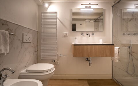 Elegant Apartments Near the Duomo: Interior Design, Flooring, Plumbing Fixture, Bathroom, Floor, Sink, Bathroom Sink, Mirror, Tap, Plumbing