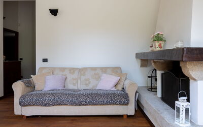 Casa Olivia With Garden And Wifi: Furniture, Interior Design, Wall, Flooring, Couch, Wood, Floor, Room, Living Room, Lighting