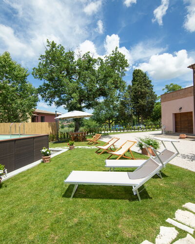 The Tuscan Retreat Spa: Residential Area, Garden, Land Lot, Outdoor Furniture, Home, Shade, Backyard, Swimming Pool, Landscaping, Estate