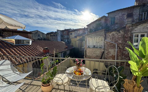 Casa Capolino: Flowerpot, Balcony, Houseplant, Apartment, Chair, Outdoor Furniture, Window Treatment