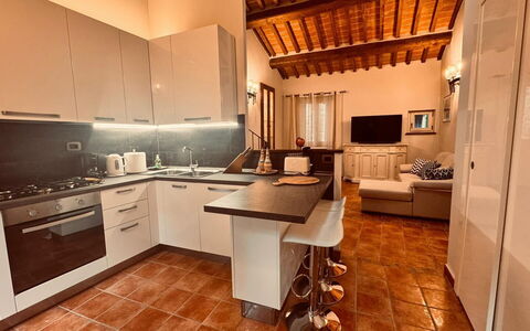 Casa Castelli: Furniture, Interior Design, Flooring, Countertop, Wood, Kitchen, Floor, Ceiling, Cabinetry, Kitchen Appliance