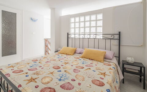 Casa Dolly, Monterosso 5 Terre: Bed, Furniture, Bedding, Interior Design, Bedroom, Bed Sheet, Floor, Linens, Wood, Flooring