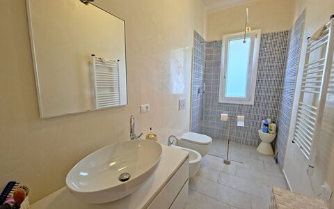 Villetta Tonfano: Flooring, Bathroom, Plumbing Fixture, Floor, Interior Design, Bathroom Sink, Sink, Tap, Plumbing, Lighting