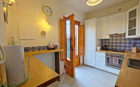 Villetta Tonfano: Interior Design, Flooring, Countertop, Kitchen, Wood, Cabinetry, Floor, Major Appliance, Kitchen Appliance, Furniture