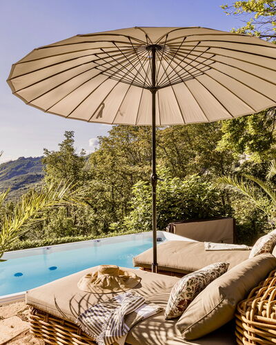 Villa Chiovada: Outdoor Furniture, Furniture, Umbrella, Resort, Shade, Eco Hotel, Chair, Swimming Pool, Leisure, Sunlounger