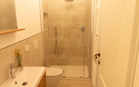 Marina's Lodge: Bathroom, Plumbing Fixture, Flooring, Bathroom Sink, Wall, Floor, Interior Design, Sink, Bathroom Cabinet, Mirror