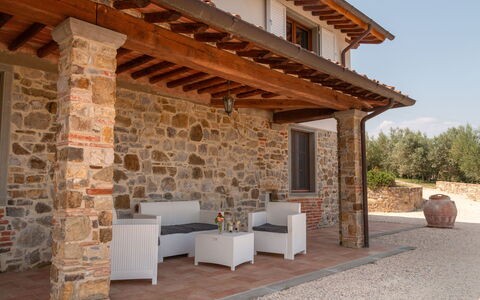 Marina's Lodge: Door, Brick, Porch, Flowerpot, Column, Beam, Wood Stain, Shade, Houseplant