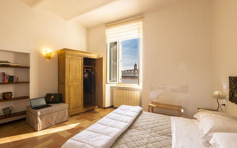 Appartamento la Fontana, Assisi: Wall, Interior Design, Furniture, Room, Apartment, Bedroom, Bed, Lighting, Floor, Ceiling