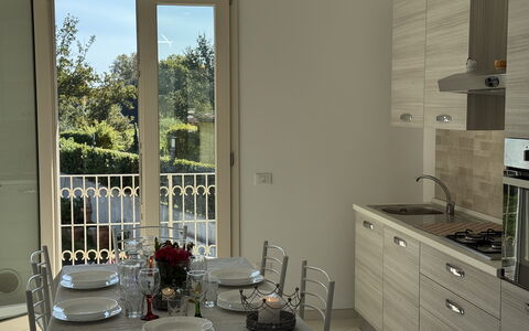 Villa al Glicine: Furniture, Interior Design, Flooring, Wood, Kitchen, Floor, Countertop, Room, Major Appliance, Lighting