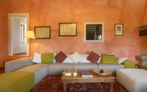 Novellina: Furniture, Interior Design, Flooring, Floor, Textile, Couch, Home, Lighting, Brown, Living Room