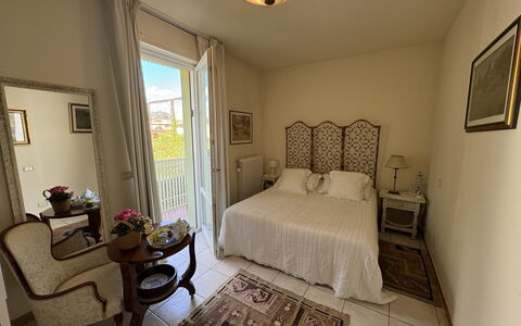 Liz: Furniture, Flooring, Floor, Interior Design, Lighting, Bedroom, Bed, Room, Linens, Bedding