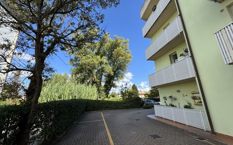 Liz: Apartment, Neighbourhood, Residential Area, Condominium, Hatchback, Family Car, Balcony, Mid-Size Car