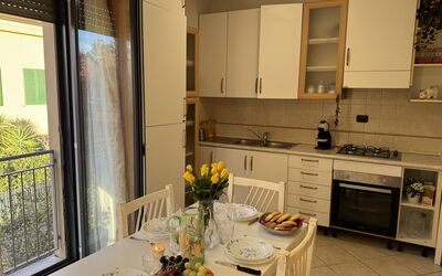 Al Civico 80: Furniture, Flooring, Wood, Interior Design, Kitchen Appliance, Kitchen, Floor, Major Appliance, Kitchen & Dining Room Table, Countertop