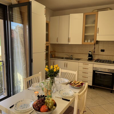 Al Civico 80: Furniture, Flooring, Wood, Interior Design, Kitchen Appliance, Kitchen, Floor, Major Appliance, Kitchen & Dining Room Table, Countertop