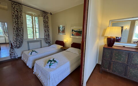 Casa Mia: Furniture, Floor, Flooring, Room, Bed, Wood Stain, Bedroom, Linens, Hardwood, Picture Frame