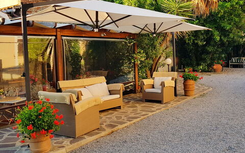 Appartamento Ibisco Seaside and Pool: Furniture, Flowerpot, Outdoor Furniture, Shade, Umbrella, Chair, Outdoor Table, Garden, Outdoor Structure