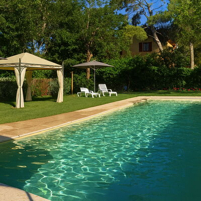 Appartamento Ibisco Seaside and Pool: Swimming Pool, Resort, Shade, Backyard, Garden, Eco Hotel, Leisure, Landscaping, Hacienda, Water Feature