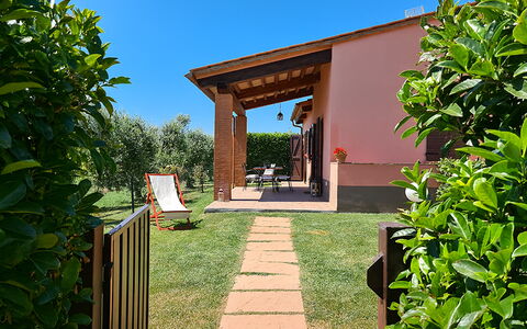 Appartamento Papavero Seaside and Pool: Garden, Shade, Lawn, Backyard, Yard, Outdoor Structure, Landscaping, Eco Hotel, Wood Stain, Estate