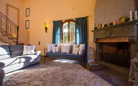 Villa Peccioli: Furniture, Interior Design, Couch, Wall, Flooring, Floor, Living Room, Textile, Room, Lighting