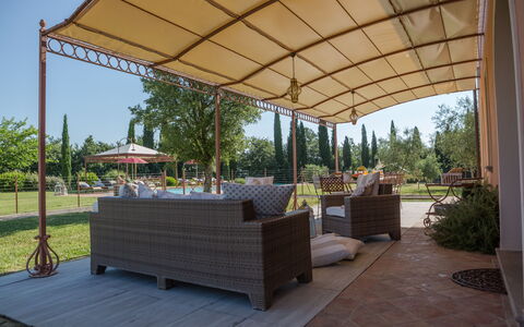 Villa Peccioli: Shade, Canopy, Furniture, Outdoor Furniture, Awning, Outdoor Structure, Chair, Garden, Outdoor Table, Gazebo