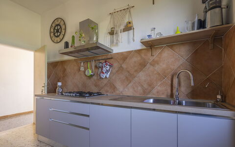 La Torre sul Ponte, Seaview, Garden: Kitchen, Kitchen Appliance, Countertop, Major Appliance, Interior Design, Wood, Flooring, Cabinetry, Kitchen Stove, Kitchen Sink