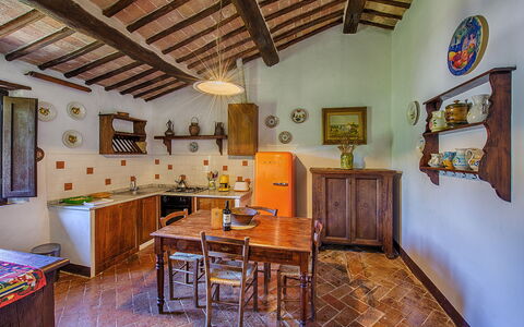 Medieval Castle Living: Vineyards, Swimming Pool &: Furniture, House, Flooring, Home, Kitchen, Room, Cabinetry, Chair, Wood Stain, Kitchen & Dining Room Table