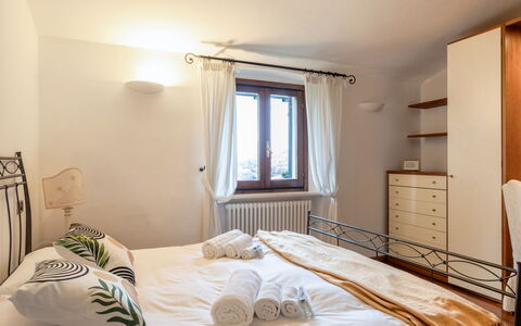 Casa Miramonti: Bed, Furniture, Bedroom, Interior Design, Bedding, Bed Sheet, Wall, Floor, Wood, Flooring