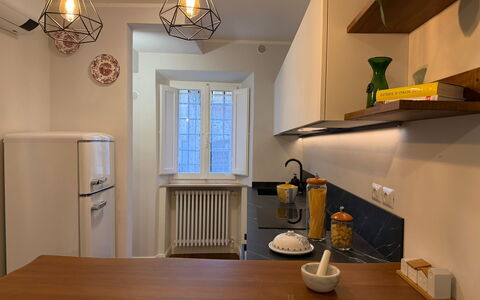 Casa Amandoli: Interior Design, Flooring, Furniture, Wood, Light Fixture, Countertop, Kitchen, Ceiling, Lighting, Kitchen Appliance