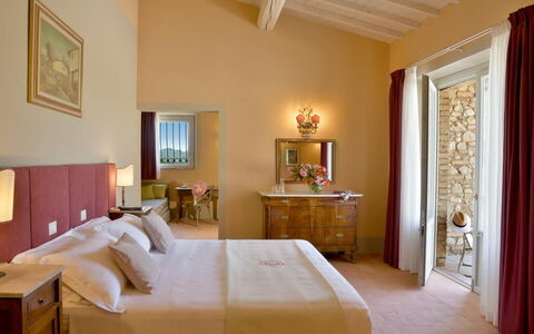 Villa Il Noccioleto: Furniture, Wall, Interior Design, Bedroom, Bed, Flooring, Floor, Room, Bed Frame, Lighting