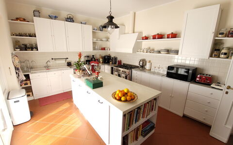 Villa El Olivar: Kitchen, Cabinetry, Kitchen Appliance, Countertop, Interior Design, Furniture, Flooring, Major Appliance, Wood, Shelf