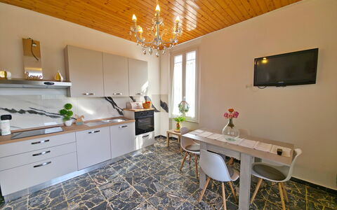 Casa Serena: Flooring, Interior Design, Furniture, Floor, Wood, Countertop, Room, Ceiling, Lighting, Cabinetry