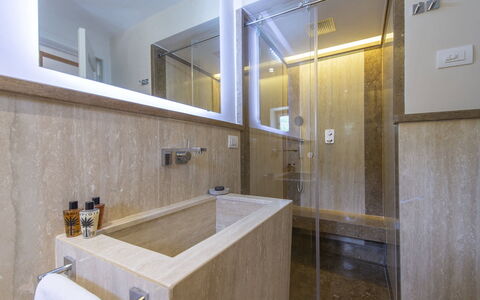 Villa Marinella: Plumbing Fixture, Flooring, Bathroom, Wood, Interior Design, Floor, Tap, Plumbing, Lighting, Tile