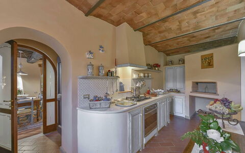 Villa delle Rose: Furniture, Kitchen, Interior Design, Flooring, Countertop, Kitchen Appliance, Home, Lighting, Cabinetry, Room