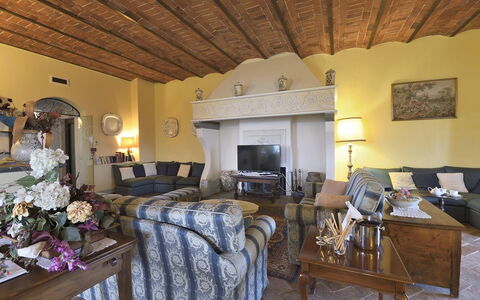 Villa Michelangelo: Furniture, Wall, Interior Design, Flooring, Couch, Living Room, Chair, Room, Home, Lighting