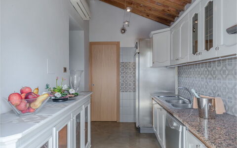 Villa Bastiano: Countertop, Kitchen, Interior Design, Furniture, Wood, Major Appliance, Flooring, Cabinetry, Kitchen Appliance, Sink