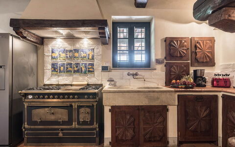 Villa del Colle: Kitchen, Interior Design, Kitchen Stove, Stove, Cabinetry, Countertop, Gas Stove, Wood Stain, Light Fixture, Kitchen Appliance