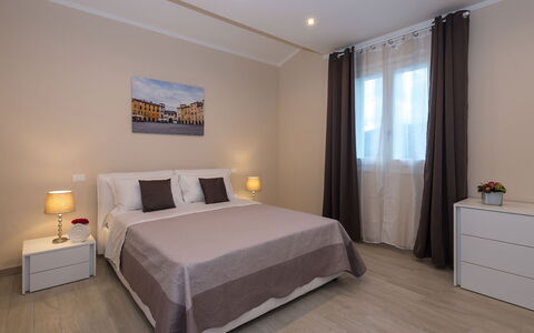 Villa Monsummano: Furniture, Interior Design, Floor, Flooring, Bed, Bedroom, Wood, Room, Textile, Bed Sheet