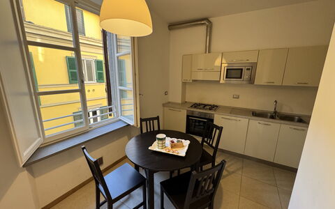 Casa Elena 13: Flooring, Floor, Interior Design, Room, Ceiling, Apartment, Kitchen & Dining Room Table, Chair, Wood Stain, Wood Flooring