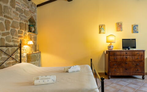 Il Giuncheto Apartments, Pool, Umbrian Countryside: Furniture, Wall, Interior Design, Flooring, Ceiling, Floor, Room, Home, Bed, Bedroom