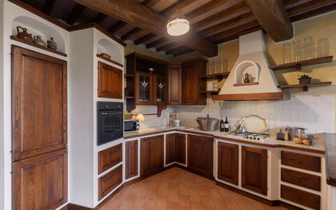 Villa Essiccatoio: Kitchen, Wood, Interior Design, Furniture, Flooring, Cabinetry, Countertop, Major Appliance, Ceiling, Kitchen Appliance