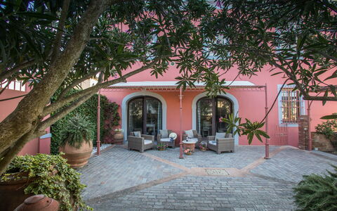 Villa Camelia: Architecture, Door, Flowerpot, Hacienda, Houseplant, Estate, Garden, Courtyard, Landscaping, Yard