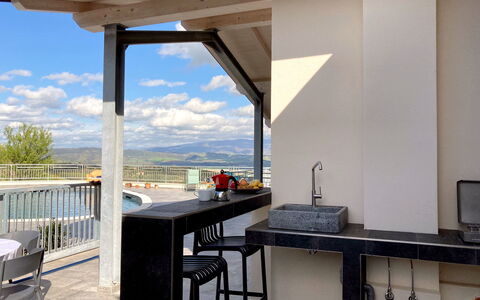 Villa Ombrone: Furniture, Chair, Outdoor Furniture, Ceiling, Shade, Kitchen & Dining Room Table, Countertop, Glass, Kitchen, Light Fixture