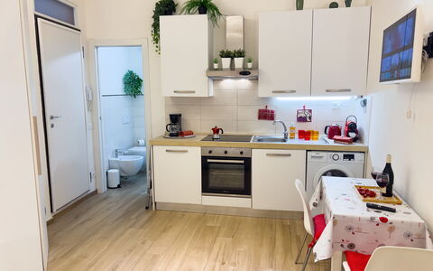 Studio Piccolo al Verticale - Levanto: Kitchen Appliance, Kitchen, Furniture, Flooring, Countertop, Major Appliance, Interior Design, Floor, Wood, Cabinetry