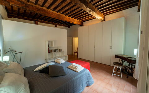 Le Loggine del Pignatello Apartment, Siena City: Wall, Furniture, Interior Design, Flooring, Wood, Bedroom, Floor, Ceiling, Bed, Room