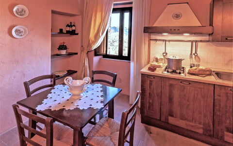 Villa Campo al Vento - Country Farm: Furniture, Interior Design, Flooring, Room, Ceiling, Lighting, Floor, Table, Kitchen & Dining Room Table, Light Fixture