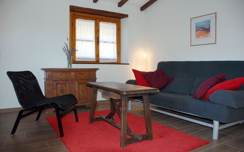 Casa Chimera: Furniture, Flooring, Interior Design, Wood, Floor, Couch, Room, Picture Frame, Living Room, Wood Flooring